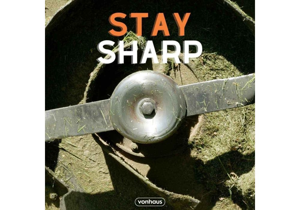Stay Sharp written on a dull lawnmower blade