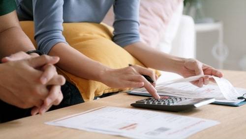 Couple budgeting for a heater