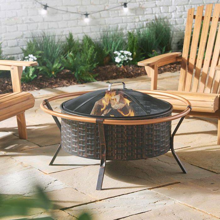 VonHaus copper rim fire pit on a patio