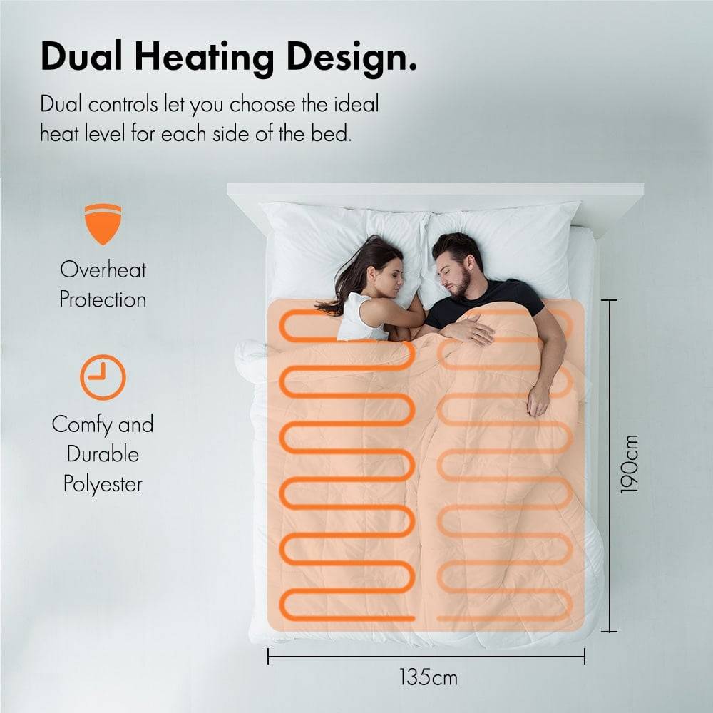 Couple sleeping in a VonHaus dual-control heated blanket