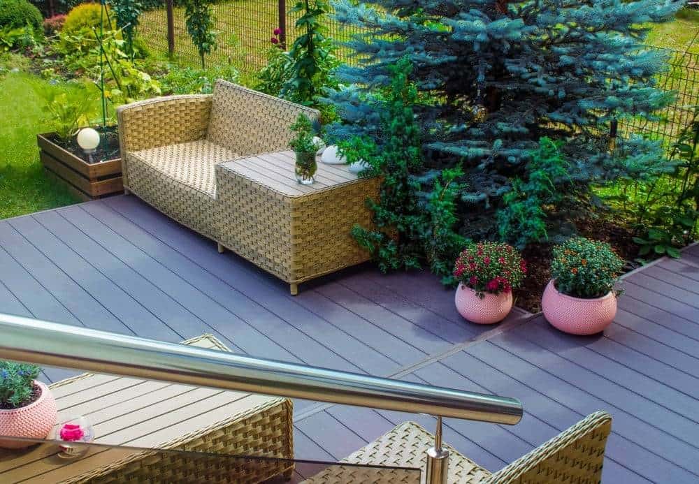 A staircase leading down to a decked patio