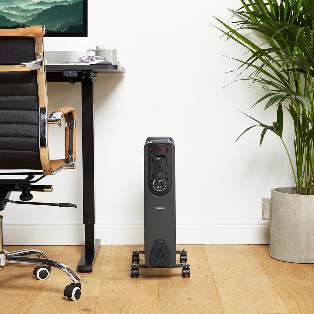 Black VonHaus oil-filled radiator in home office