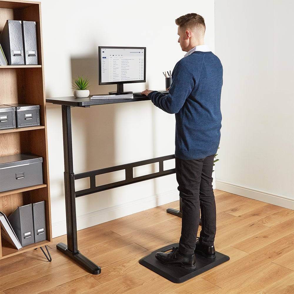 Man working a standing desk