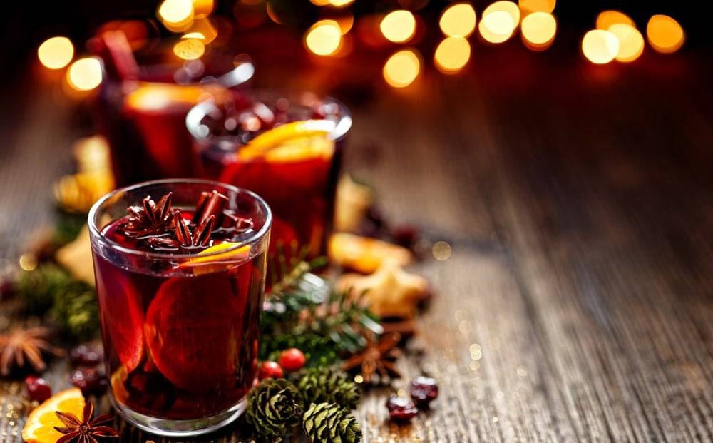 Mulled wine surrounded by Christmas lights