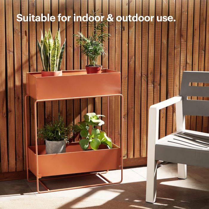 VonHaus burnt orange double plant stand outdoors