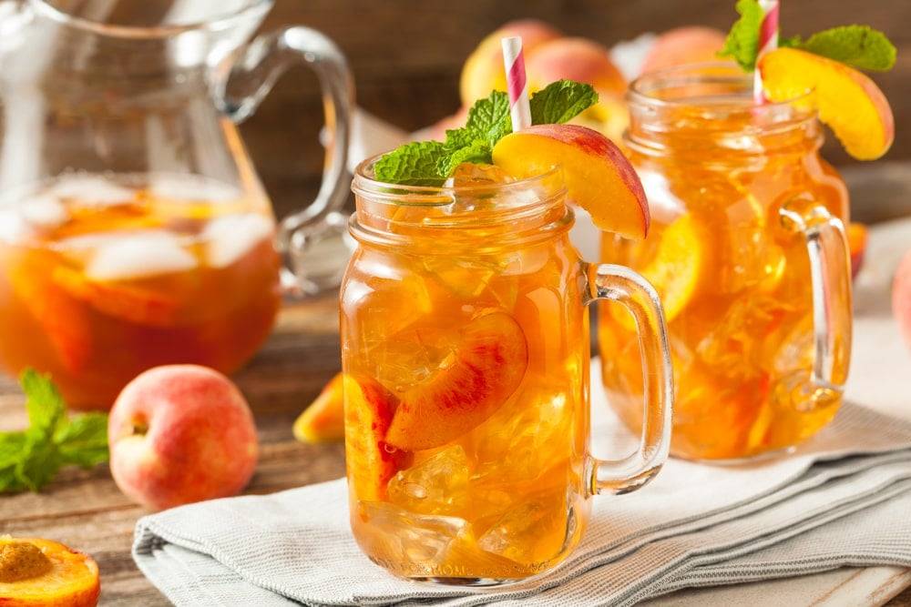 Peach iced tea in mason jars