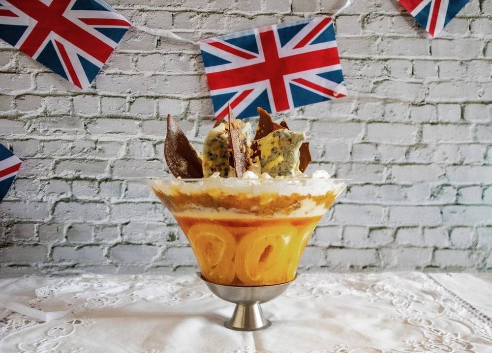 Platinum pudding on a table with bunting in the background
