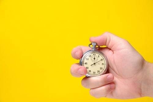 Timer against bright yellow backdrop