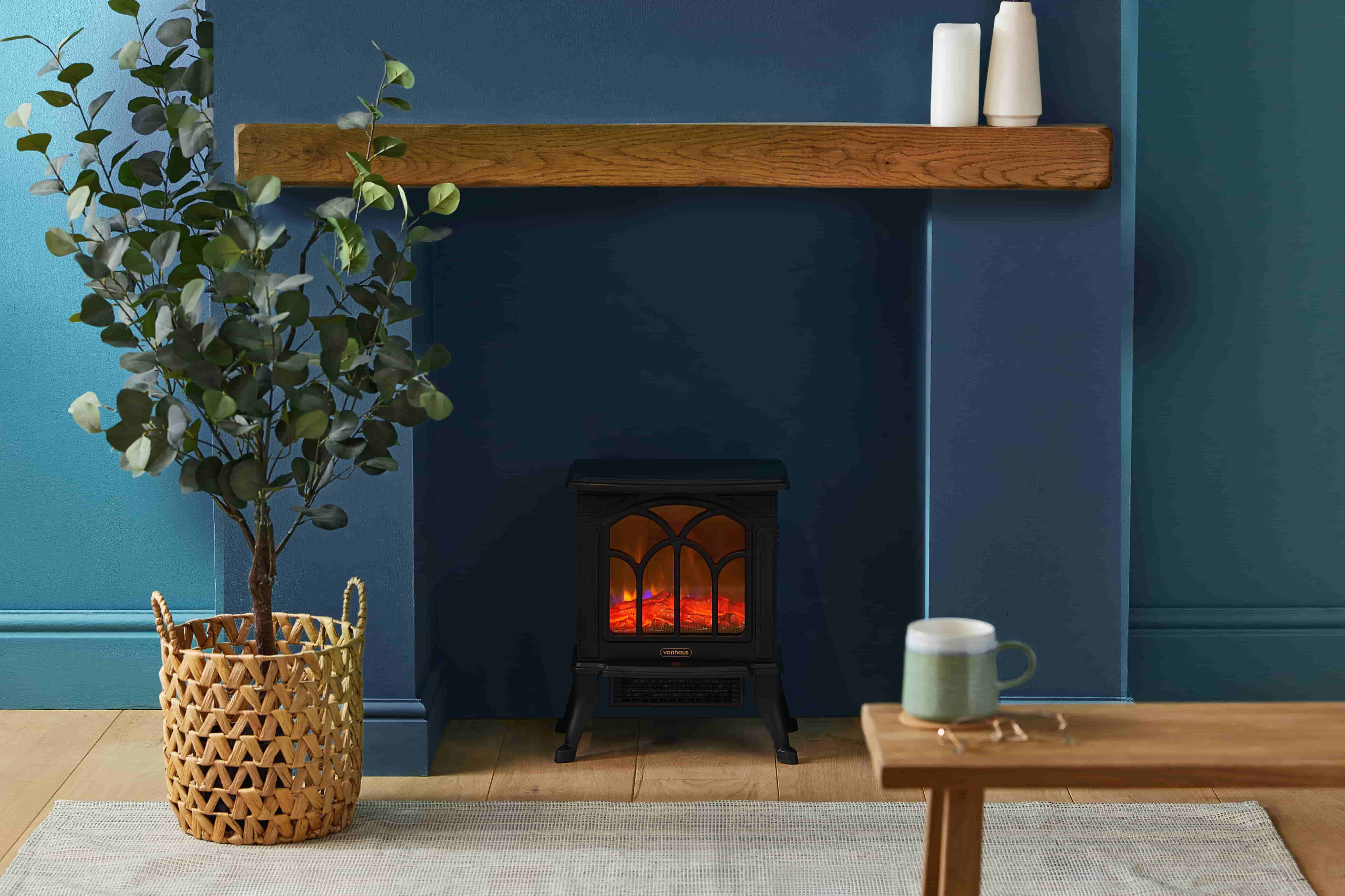 Vonhaus Black Stove Heater 1500W in modern living room