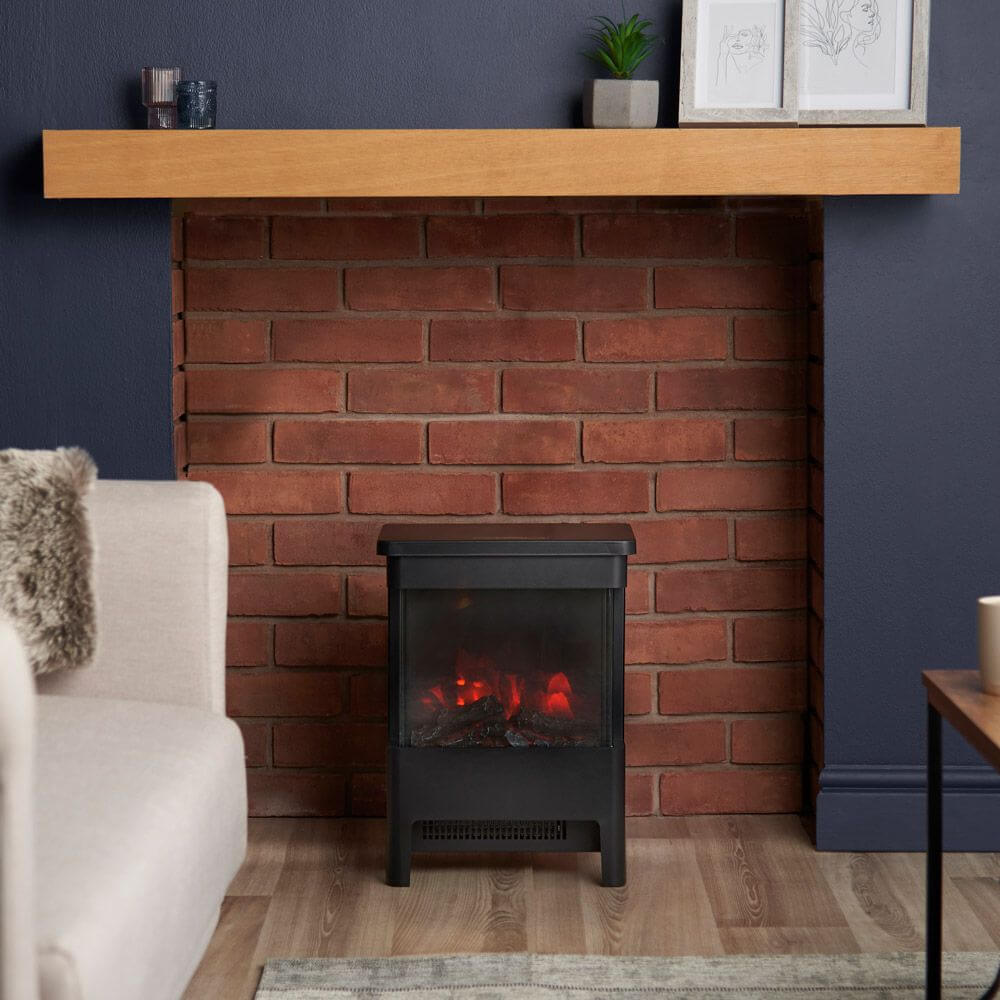 Modern Vonhaus glass front stove heater in a modern room