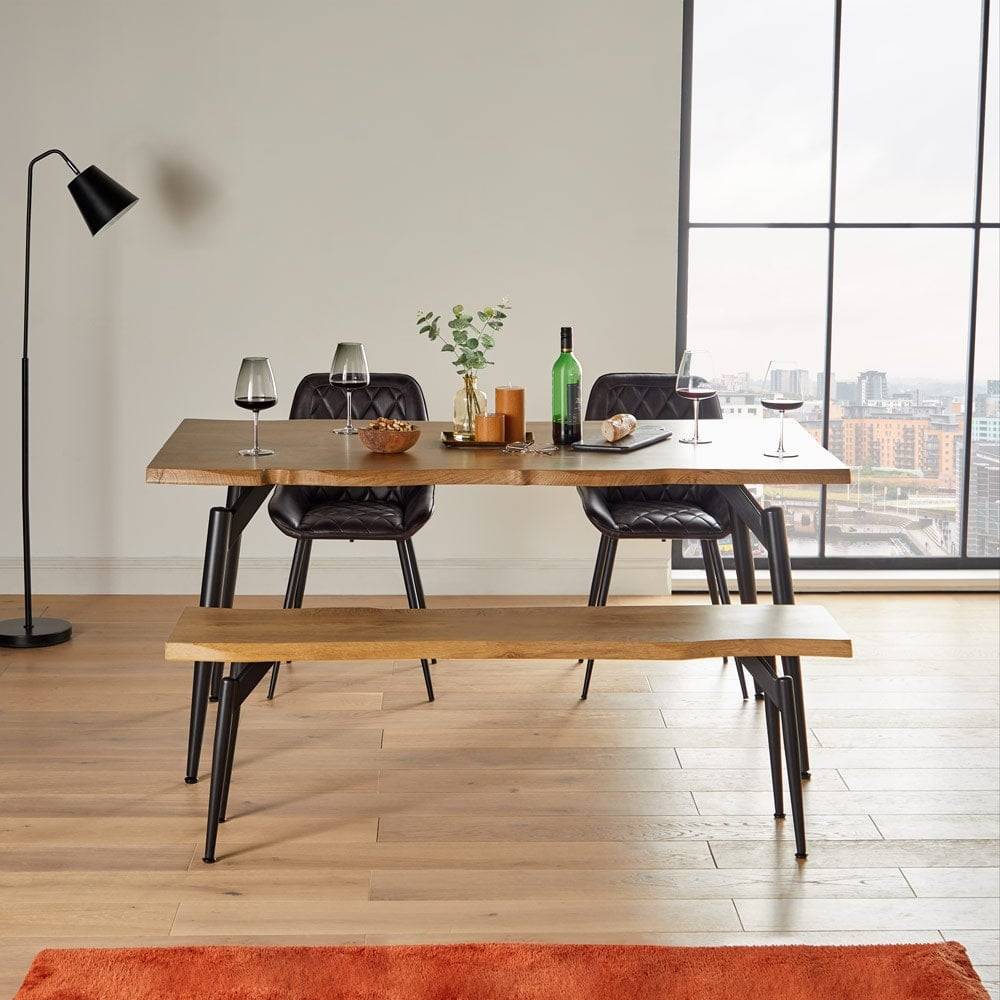 Wooden live edge dining table in a contemporary apartment