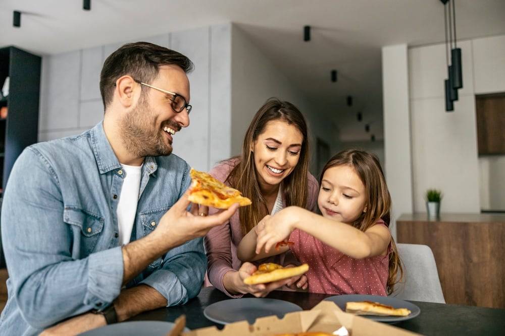 Family eating pizza