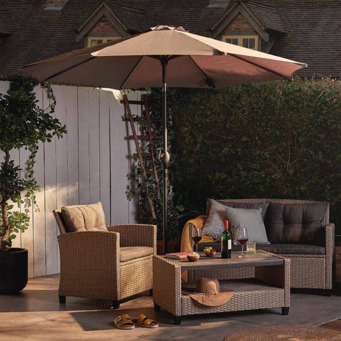 Grey parasol on backyard decking