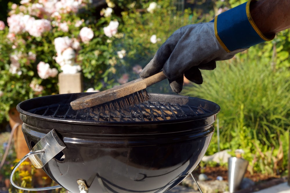 Cleaning BBQ grates with a hardwire brush