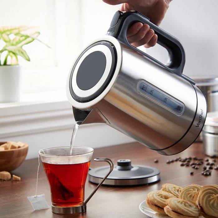 Pouring hot water from a variable temperature kettle 